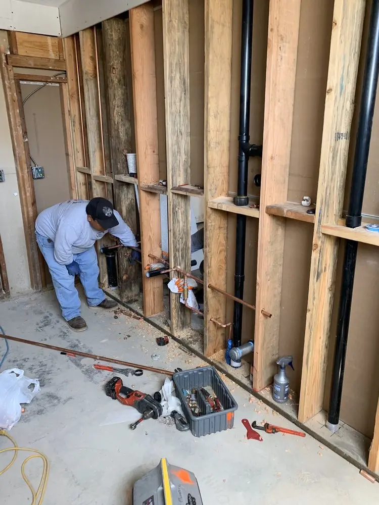 Commercial rough-in plumbing for Water Heater Replacement in Ennis